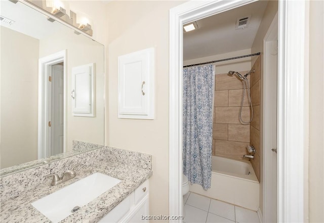 full bathroom featuring tile patterned floors, vanity, shower / bathtub combination with curtain, and toilet