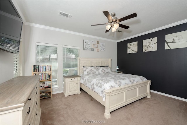 bedroom featuring light carpet, ceiling fan, and ornamental molding