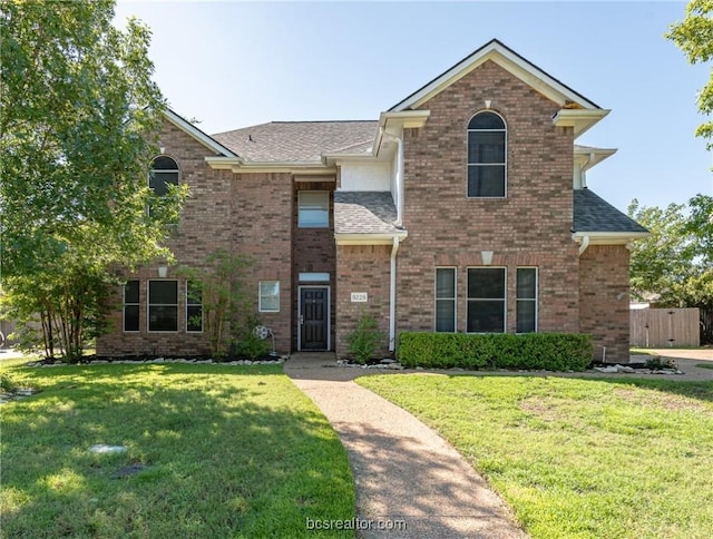 front facade featuring a front lawn