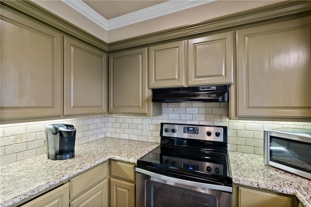 kitchen featuring light stone counters, tasteful backsplash, appliances with stainless steel finishes, ornamental molding, and under cabinet range hood