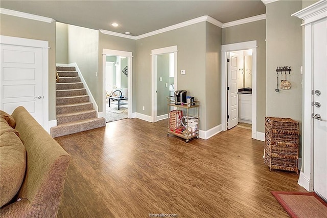 entryway featuring stairs, baseboards, dark wood finished floors, and crown molding