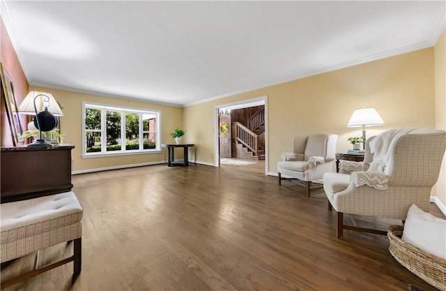 501 College View Dr, Bryan, TX 77801 - sitting room featuring ornamental molding, wood finished floors, stairs, and baseboards