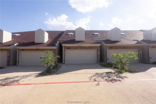 view of property featuring a garage