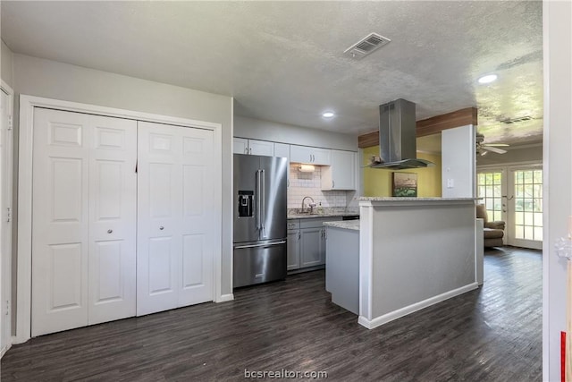 kitchen featuring gray cabinetry, sink, high end fridge, dark hardwood / wood-style flooring, and island exhaust hood