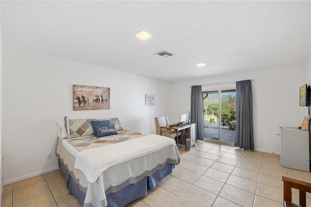 bedroom with access to exterior, light tile patterned floors, and baseboards