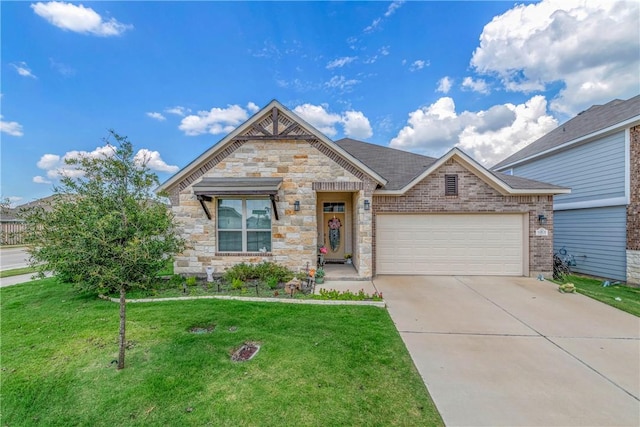 view of front of home with a front yard and a garage