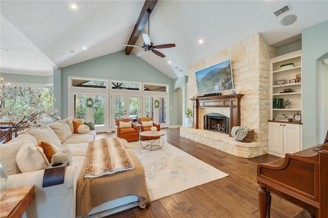 5395 Stirrup Dr, College Station, TX 77845 - living area with beam ceiling, a ceiling fan, high vaulted ceiling, wood finished floors, and recessed lighting