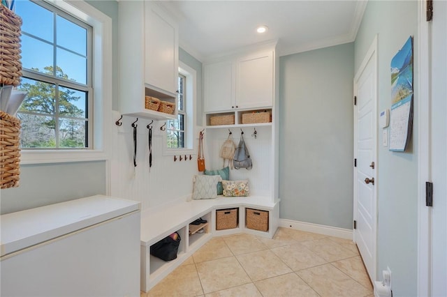 5395 Stirrup Dr, College Station, TX 77845 - mudroom featuring light tile patterned flooring, crown molding, and recessed lighting