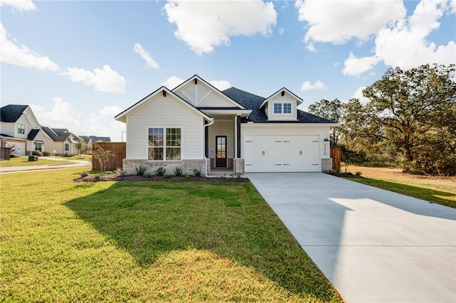 craftsman-style house featuring a garage and a front lawn