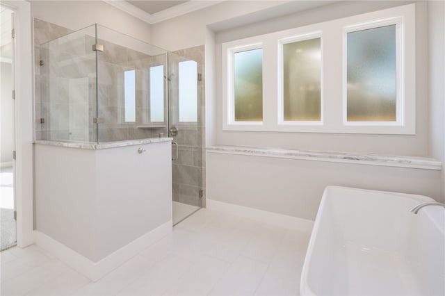 bathroom with tile patterned floors, separate shower and tub, a healthy amount of sunlight, and crown molding