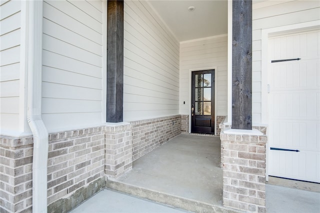 property entrance with a porch