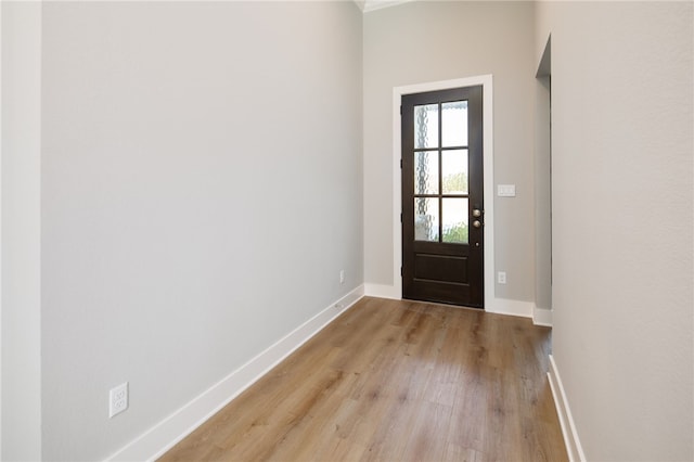 entryway with light hardwood / wood-style floors