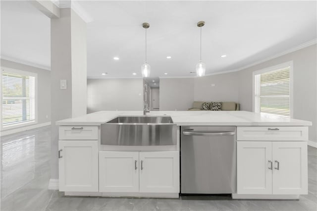 kitchen featuring stainless steel dishwasher, pendant lighting, white cabinets, and sink