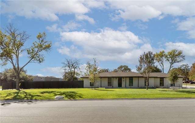 ranch-style house with a front yard