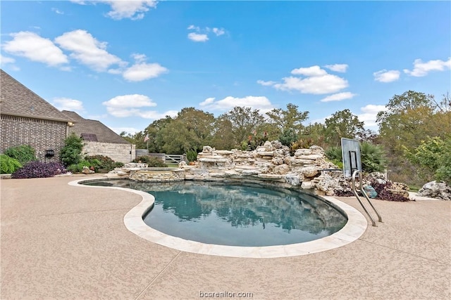 view of pool with a patio