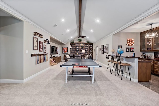 rec room featuring bar, ceiling fan, light colored carpet, and lofted ceiling with beams