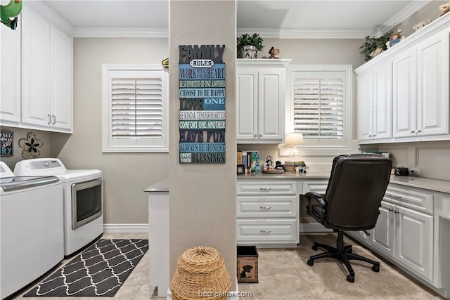 laundry room with cabinets, washer and clothes dryer, and crown molding