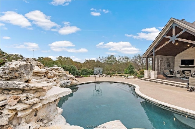 view of pool with a patio area