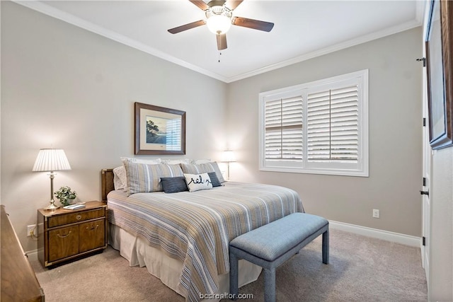 bedroom featuring ceiling fan, light carpet, and ornamental molding