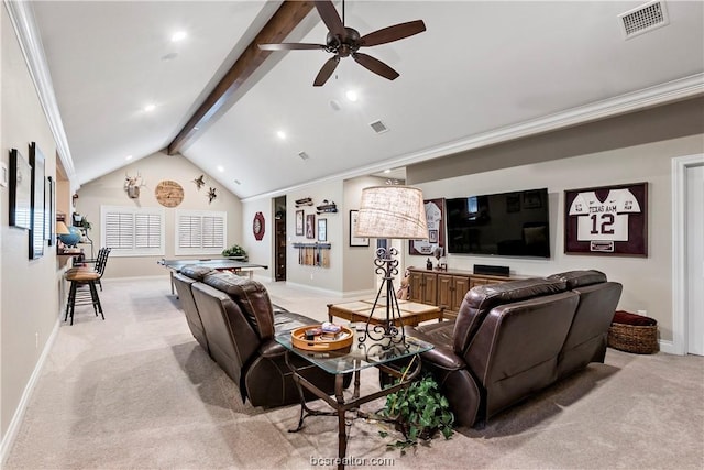 carpeted living room with lofted ceiling with beams, ceiling fan, and crown molding