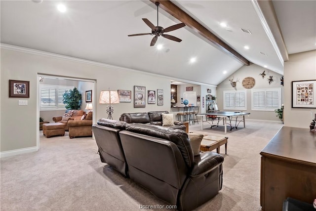 carpeted living room with beam ceiling, high vaulted ceiling, ceiling fan, and crown molding