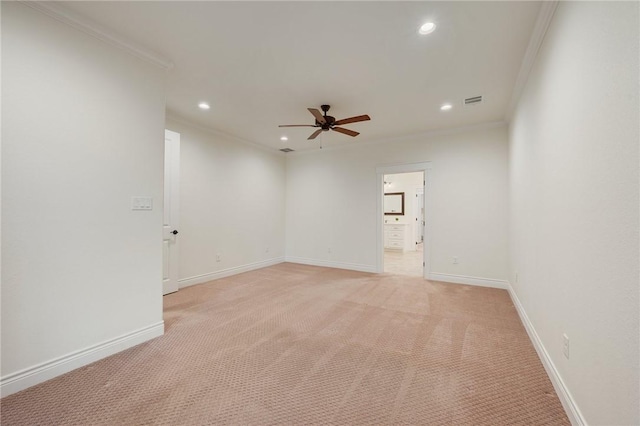 spare room featuring recessed lighting, baseboards, ornamental molding, and ceiling fan