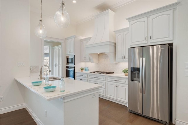 kitchen with tasteful backsplash, custom range hood, white cabinets, and stainless steel appliances