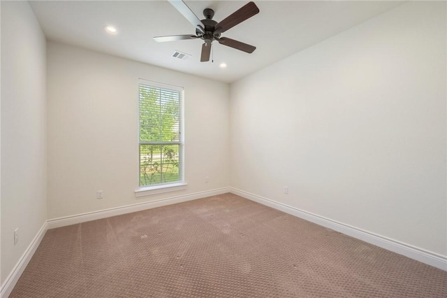 unfurnished room with ceiling fan, visible vents, recessed lighting, light carpet, and baseboards