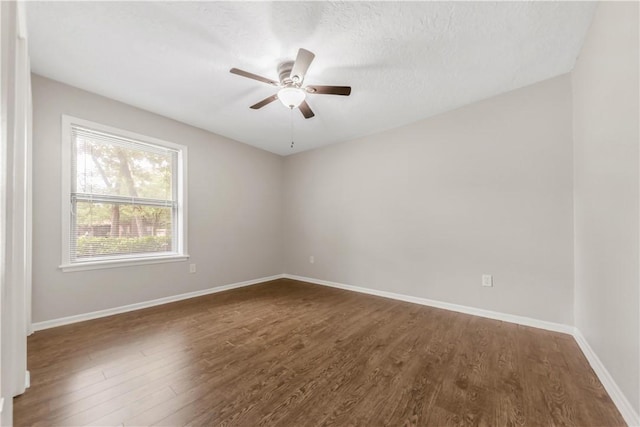 2904 Adrienne Dr, College Station, TX 77845 - empty room featuring dark wood-style flooring and ceiling fan
