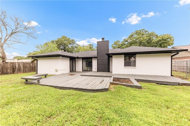 2904 Adrienne Dr, College Station, TX 77845 - rear view of house featuring a chimney and a deck