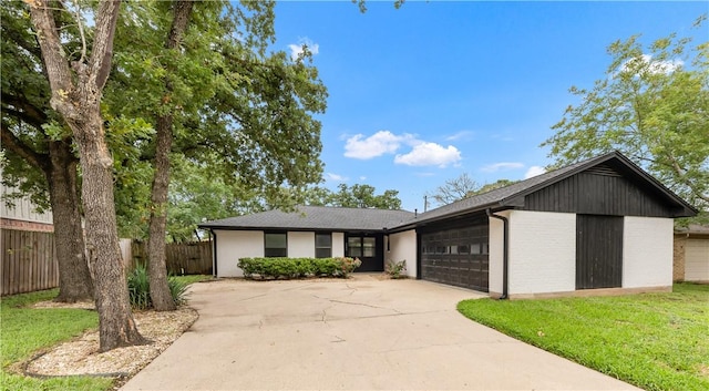 2904 Adrienne Dr, College Station, TX 77845 - view of front of home with a garage and concrete driveway