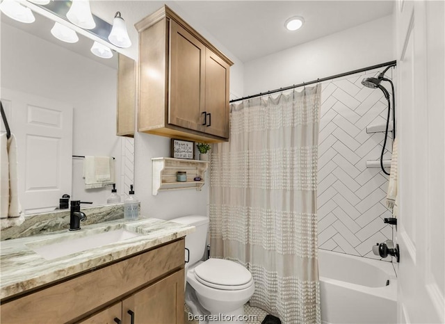 full bathroom featuring shower / tub combo, vanity, and toilet