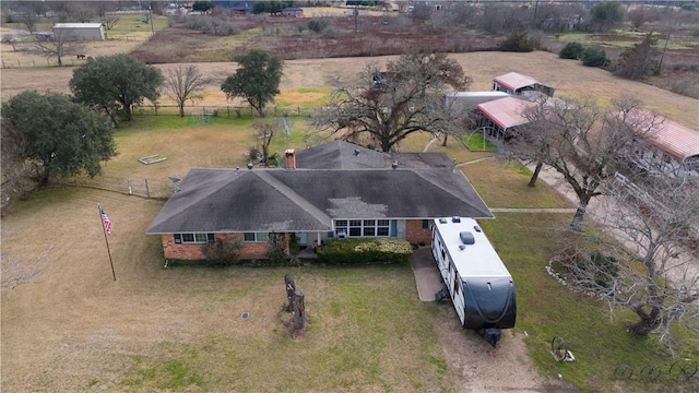 birds eye view of property featuring a rural view