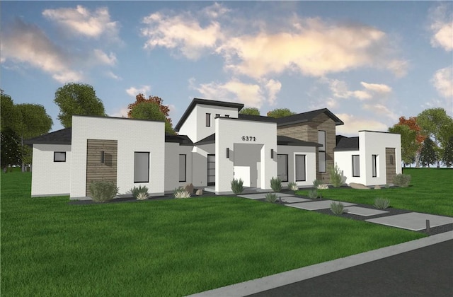 5371 Legend Oaks Ct, College Station, TX 77845 - contemporary house with a front yard and brick siding