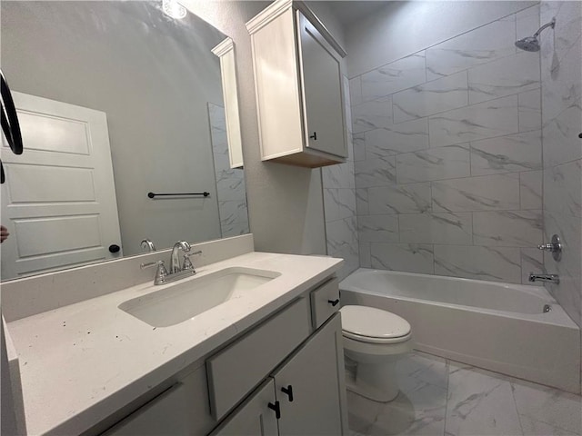 bathroom featuring toilet, marble finish floor, bathtub / shower combination, and vanity