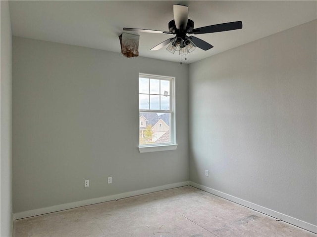 unfurnished room with ceiling fan