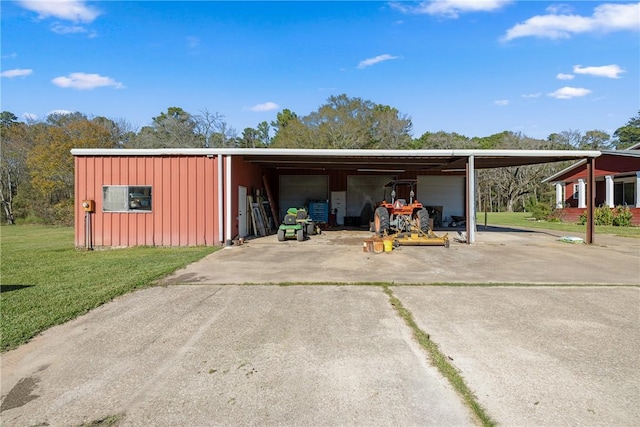 view of outbuilding featuring a lawn