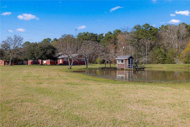 view of yard with a water view