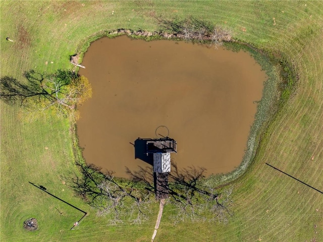 drone / aerial view with a rural view and a water view