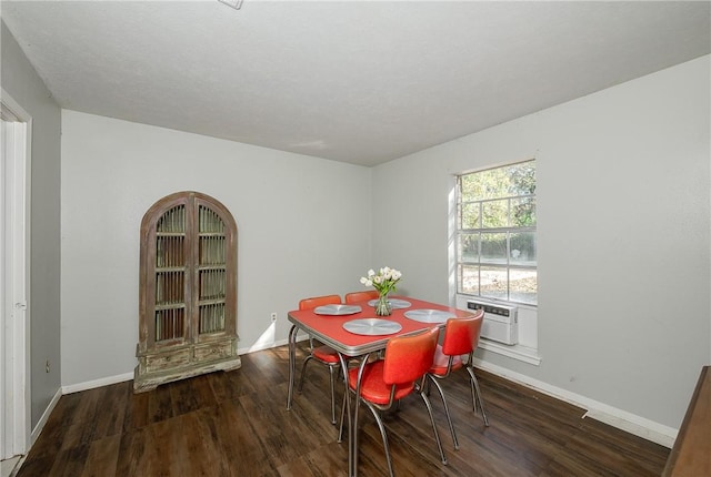 dining space with dark hardwood / wood-style floors and cooling unit