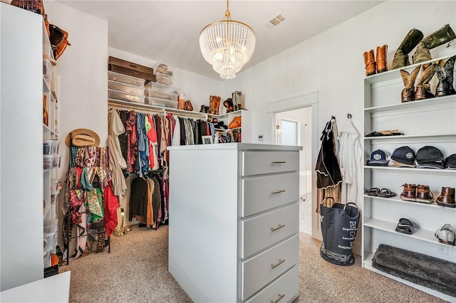 4302 Fox River Ln, Bryan, TX 77802 - spacious closet with a chandelier, visible vents, and carpet floors