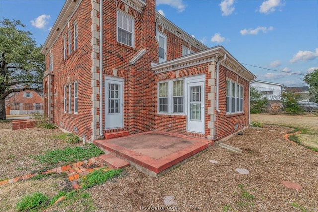 back of house featuring a patio