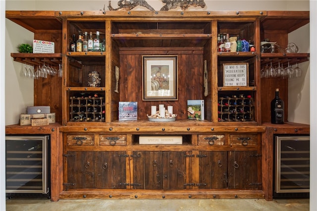 bar featuring a bar and beverage cooler