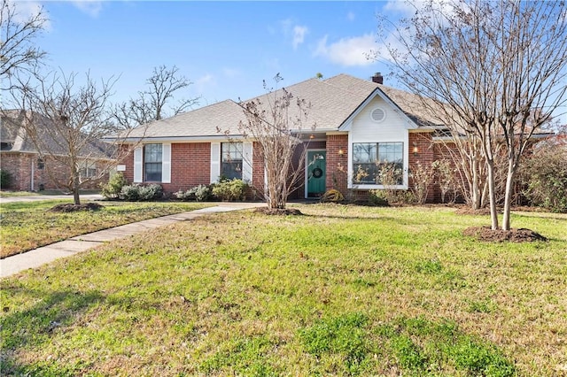 ranch-style house featuring a front yard