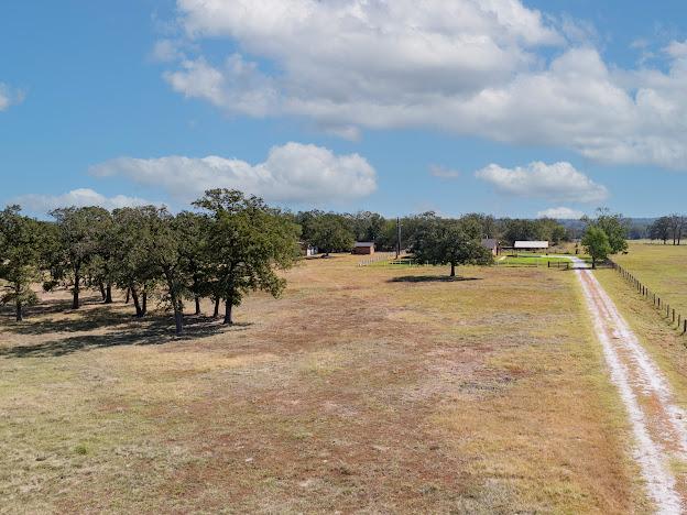 view of yard with a rural view