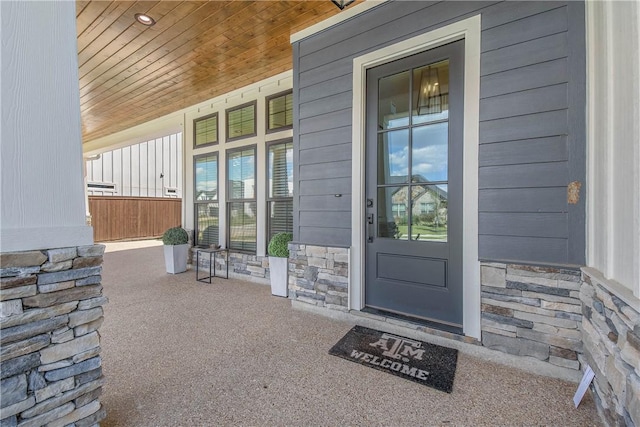 doorway to property with a porch