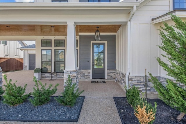 property entrance featuring covered porch