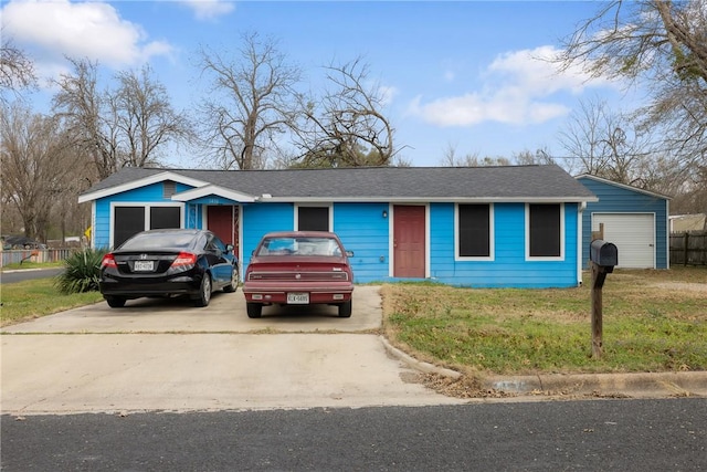 single story home with a garage and a front lawn