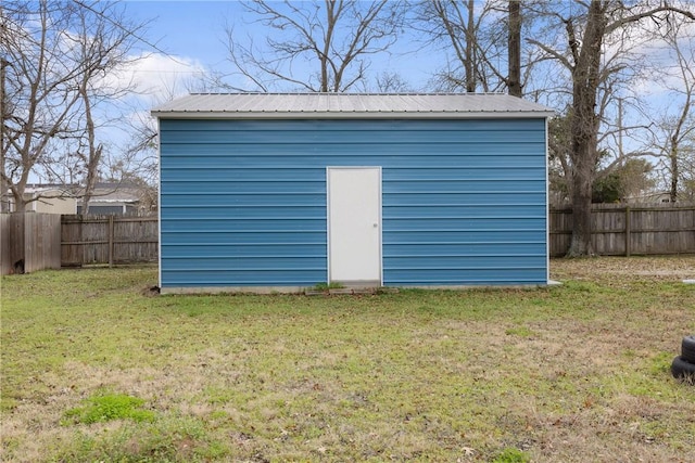 view of outdoor structure with a yard