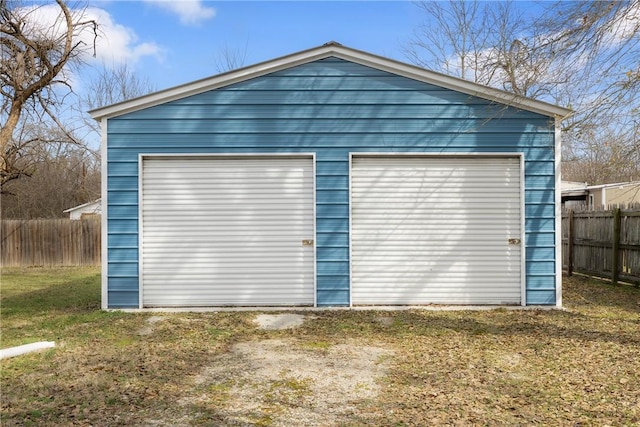 garage with a yard